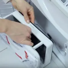 Jak wyczyścić pojemnik na wodę w suszarce, aby uniknąć awarii
